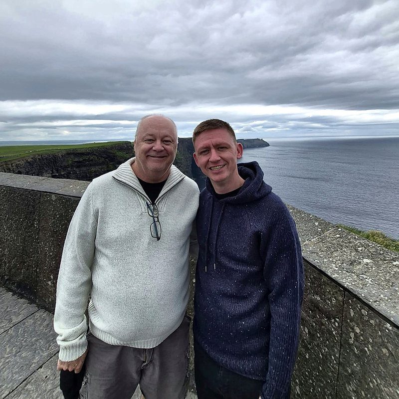 Tom and Jay on a coastal clifftop